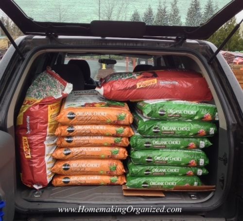 a car trunk full of garden soil