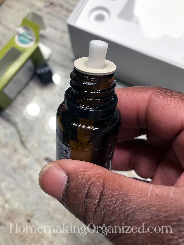 Wick inserted into Essential Oil Bottle.